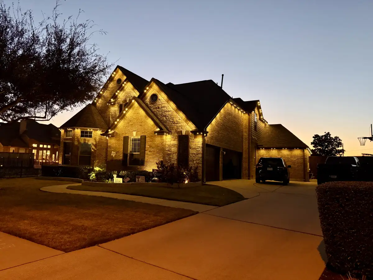 Permanent outdoor lighting highlighting home architecture