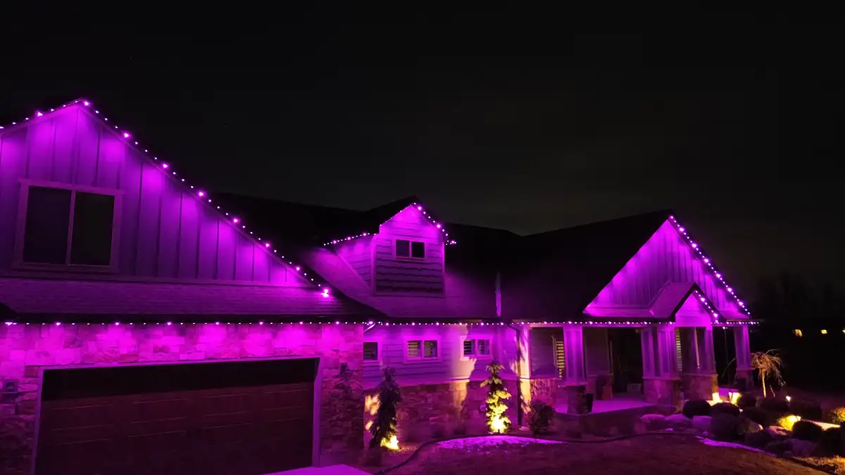 Christmas lighting display on home and landscaping