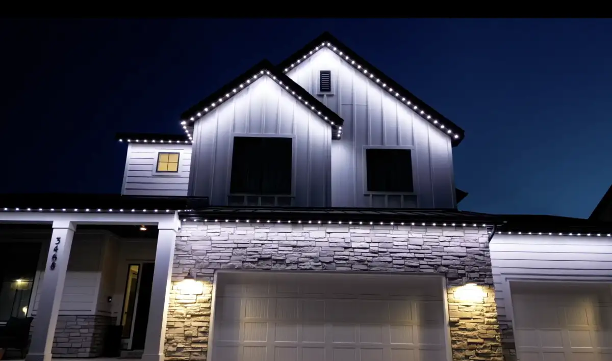 Security lighting illuminating a driveway and entry
